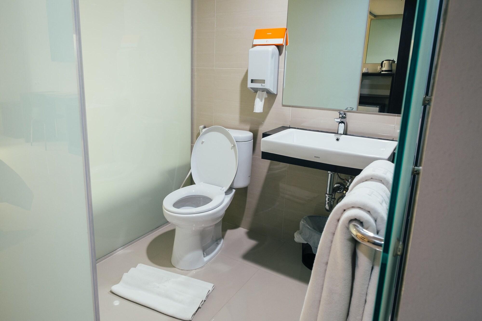 Alpha Hotel Пеканбару Экстерьер фото