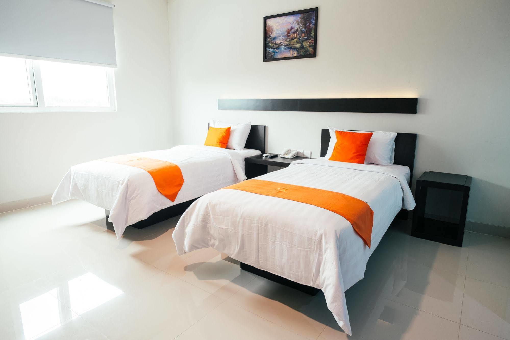 Alpha Hotel Пеканбару Экстерьер фото